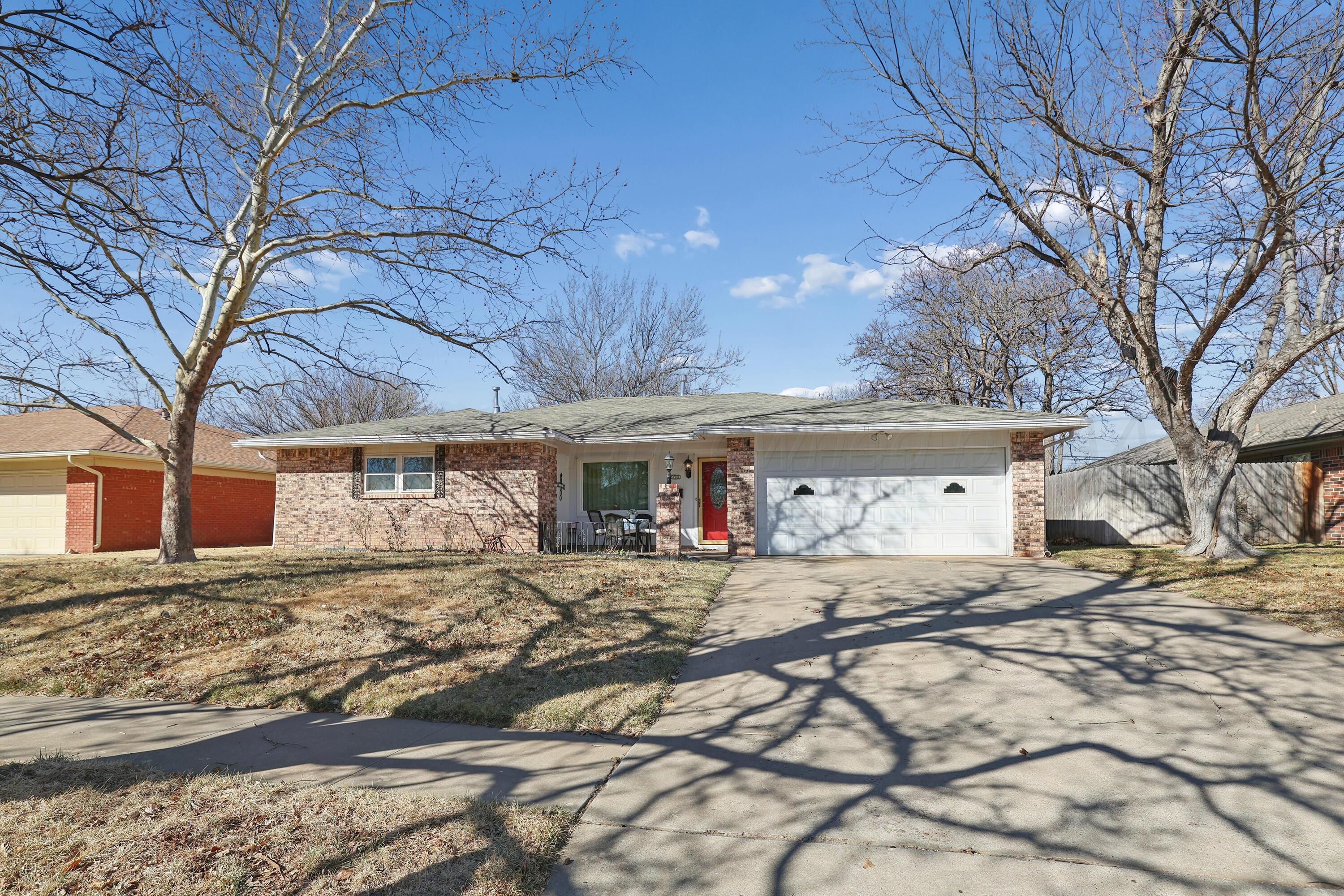 3708 Wayne Street Amarillo, TX 79109 - Photo 3 of 36 a front view of a house with a yard
