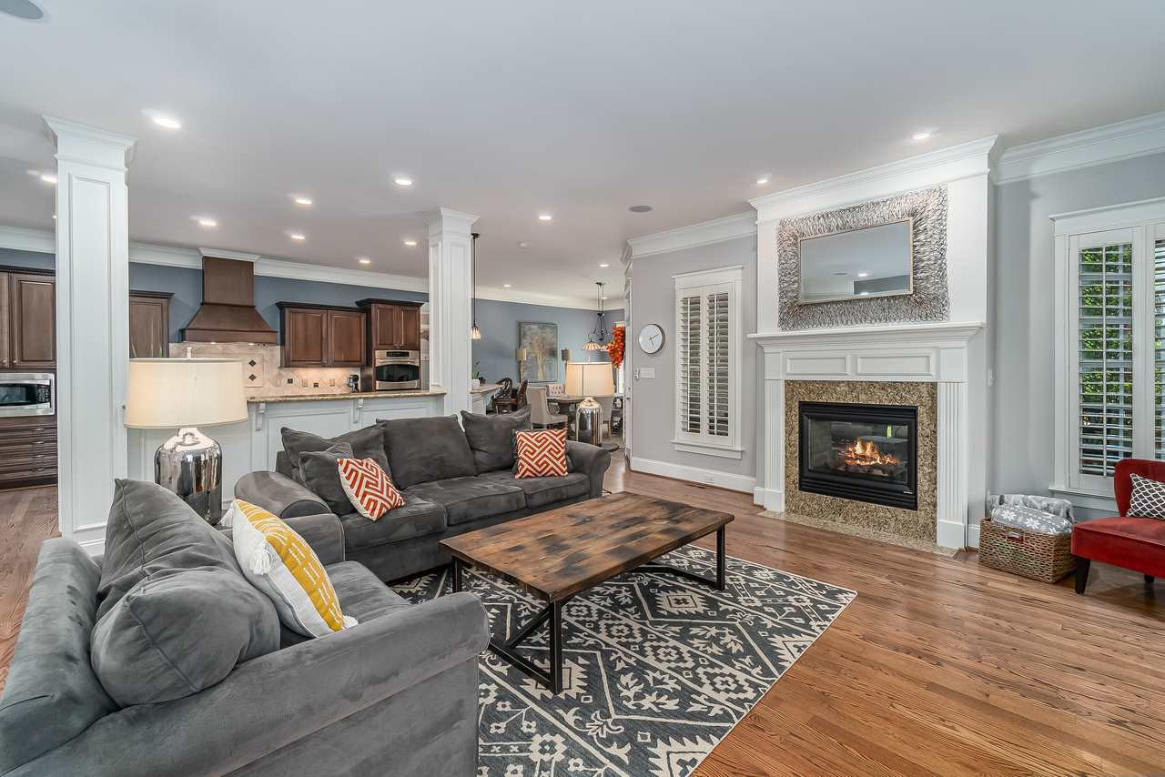 2815 Country Charm Road Raleigh, NC 27614 - Photo 30 of 30 2 Sided fireplace with open floor plan to kitchen Family Room