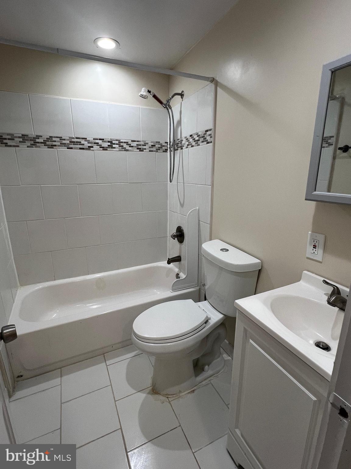 7510 Sanner Road Laurel, MD 20723 - Photo 19 of 26 a bathroom with a toilet and a shower