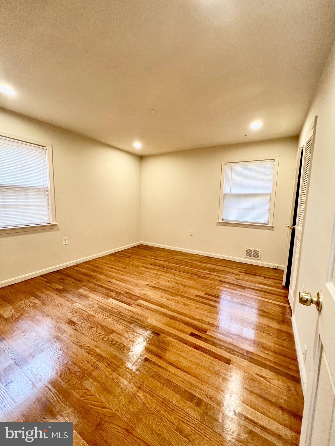 7510 Sanner Road Laurel, MD 20723 - Photo 9 of 26 a view of empty room with wooden floor