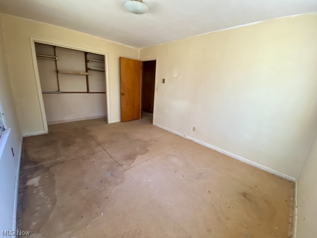 9520 Stone Road Litchfield, OH 44253 - Photo 16 of 22 Unfurnished bedroom featuring a closet