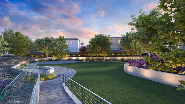 a view of a swimming pool and lounge chairs on th terrace