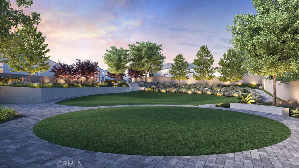 2053 West Pearl Street Encinitas, CA 92024 - Photo 12 of 14 a view of a field of grass and trees