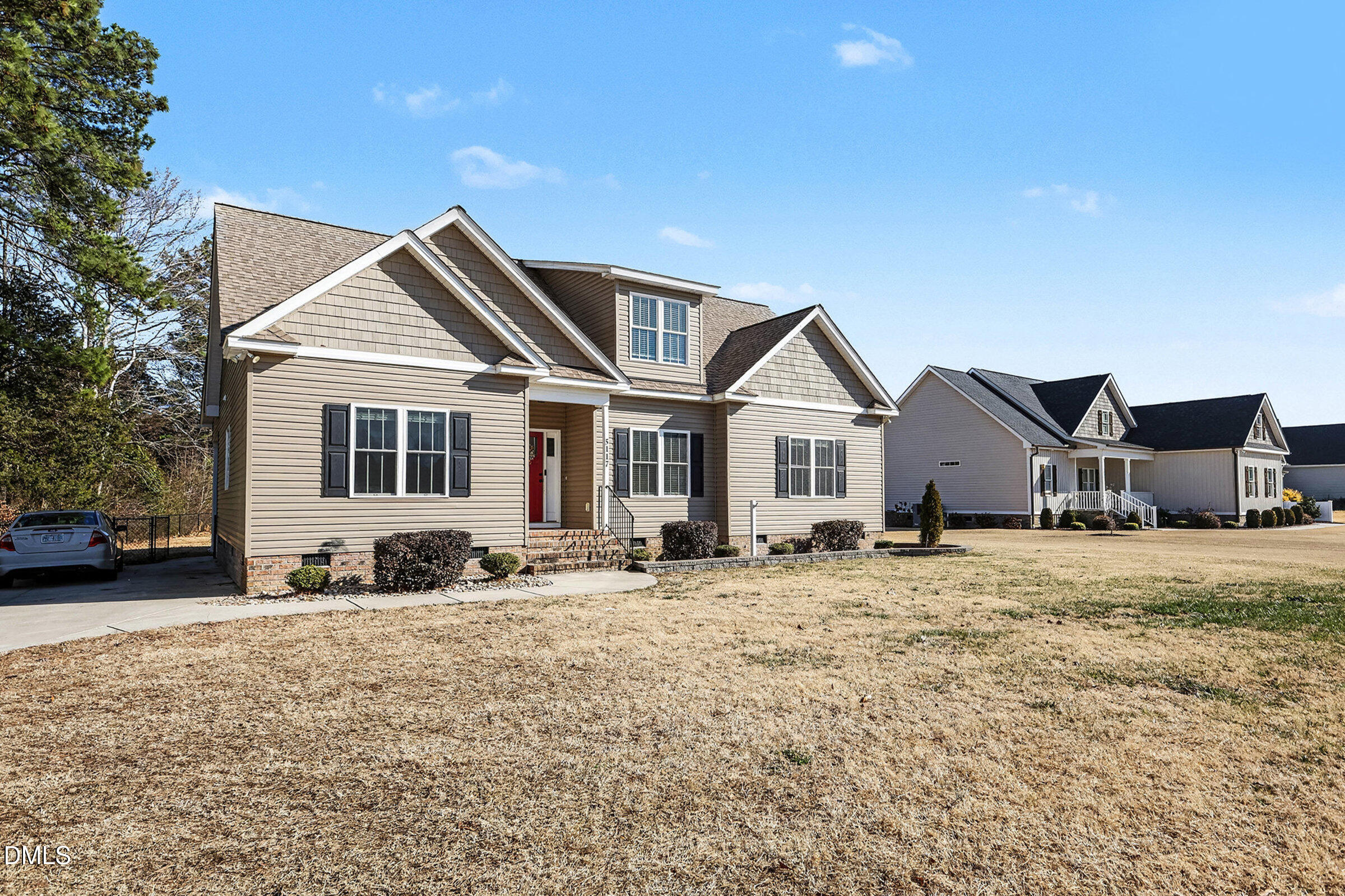 5117 Joe Ellen Road Battleboro, NC 27809 - Photo 3 of 23 a front view of a house with a yard