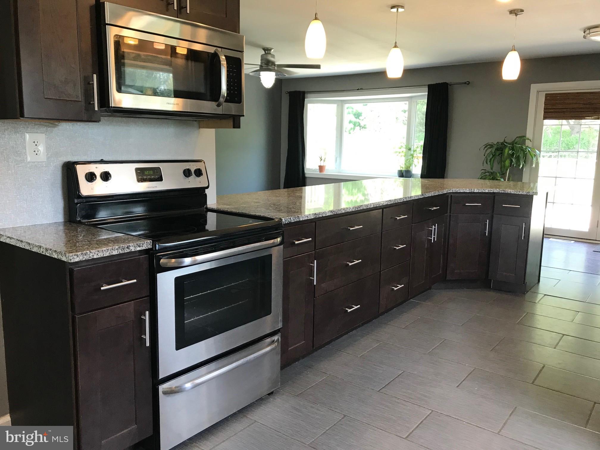Kitchen with SS Appliances