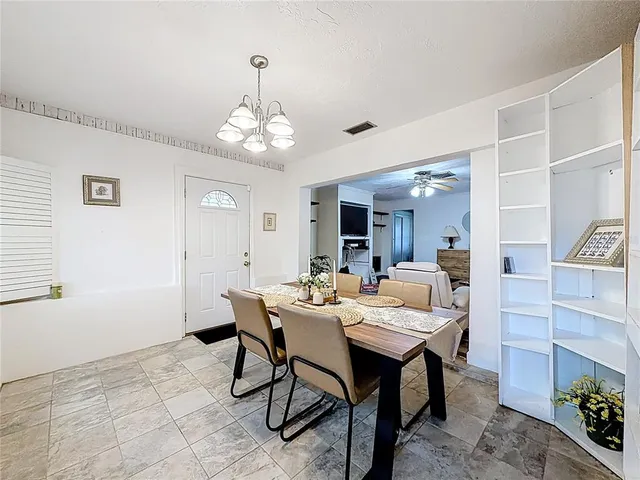 a view of a dining room with furniture