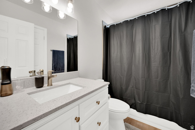 1284 North 900 West Clinton, UT 84015 - Photo 20 of 22 Bathroom with vanity and toilet