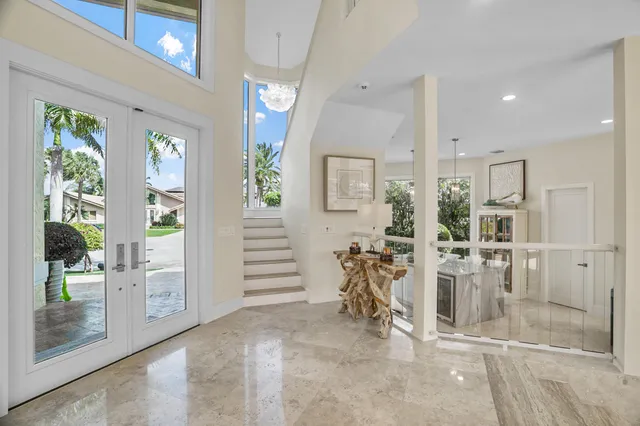 a view of a livingroom with furniture and windows