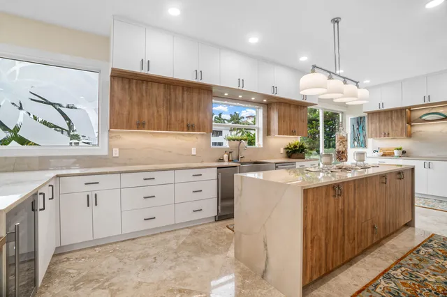 a view of a hallway view with wooden floor and staircase