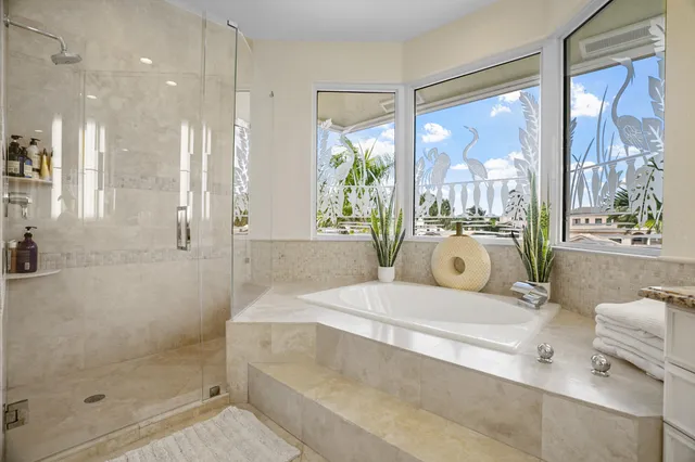 a view of a lake with couches chairs