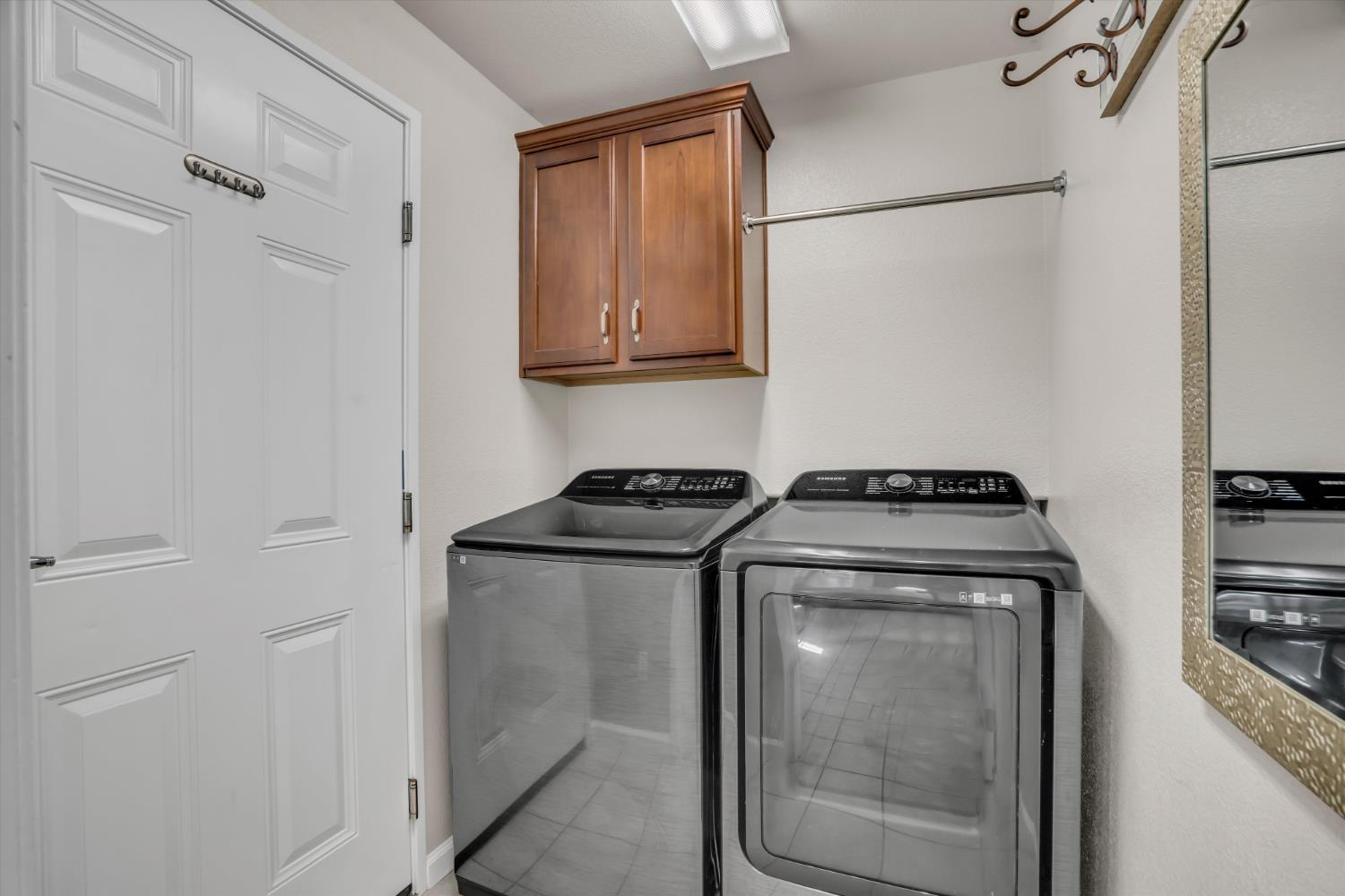 62 South Rio Rapido Drive Tracy, CA 95391 - Photo 18 of 40 a utility room with washer and dryer