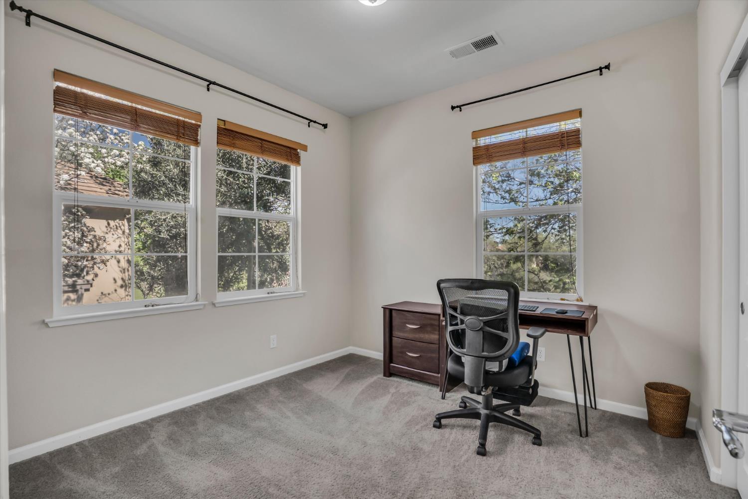 62 South Rio Rapido Drive Tracy, CA 95391 - Photo 21 of 40 a view of a workspace with furniture and a window