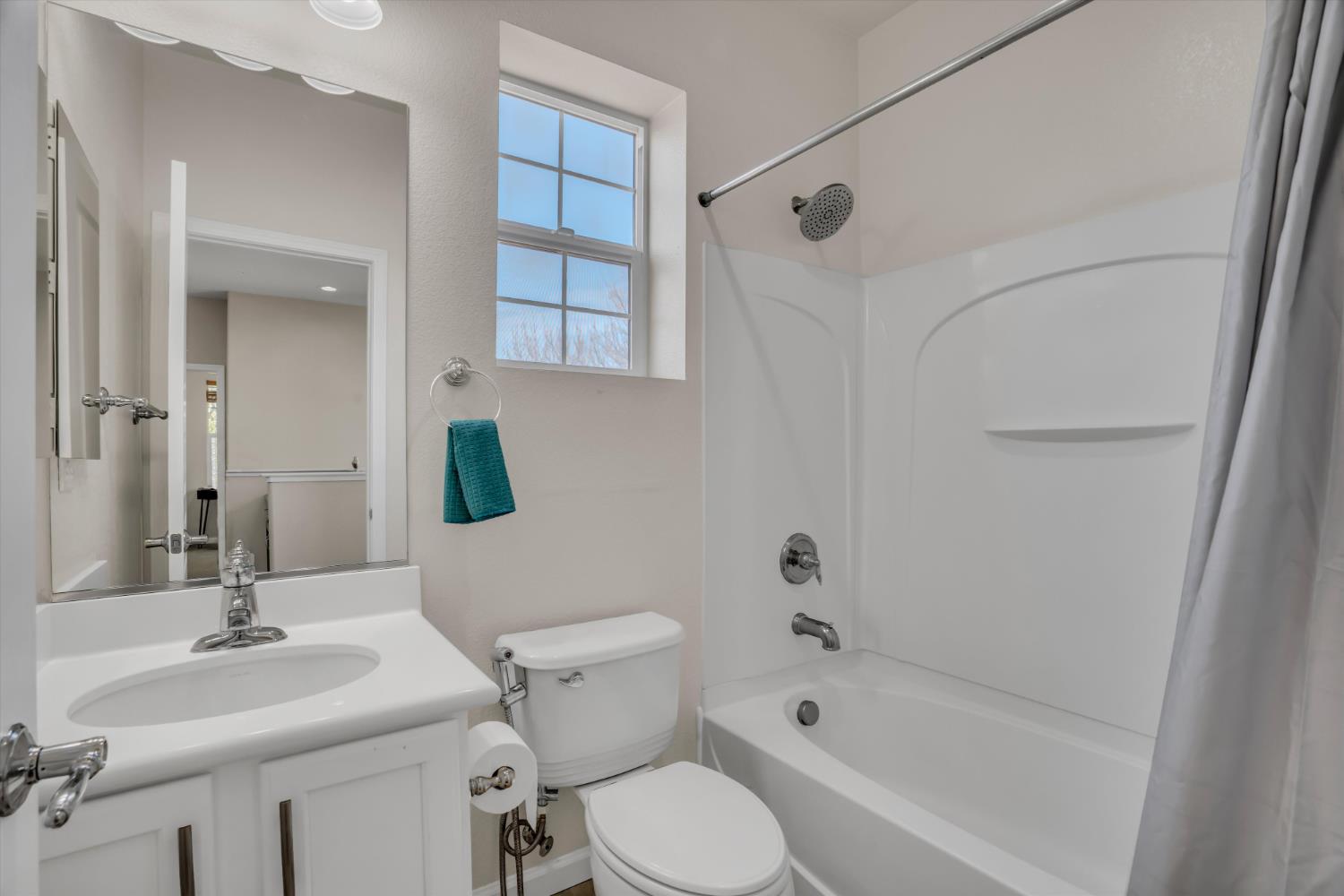 62 South Rio Rapido Drive Tracy, CA 95391 - Photo 22 of 40 a bathroom with a sink toilet tub and shower