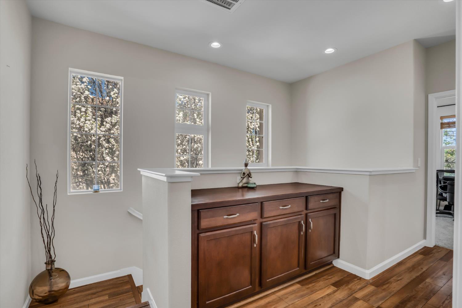 62 South Rio Rapido Drive Tracy, CA 95391 - Photo 23 of 40 a kitchen with stainless steel appliances granite countertop a sink a stove and a wooden floors
