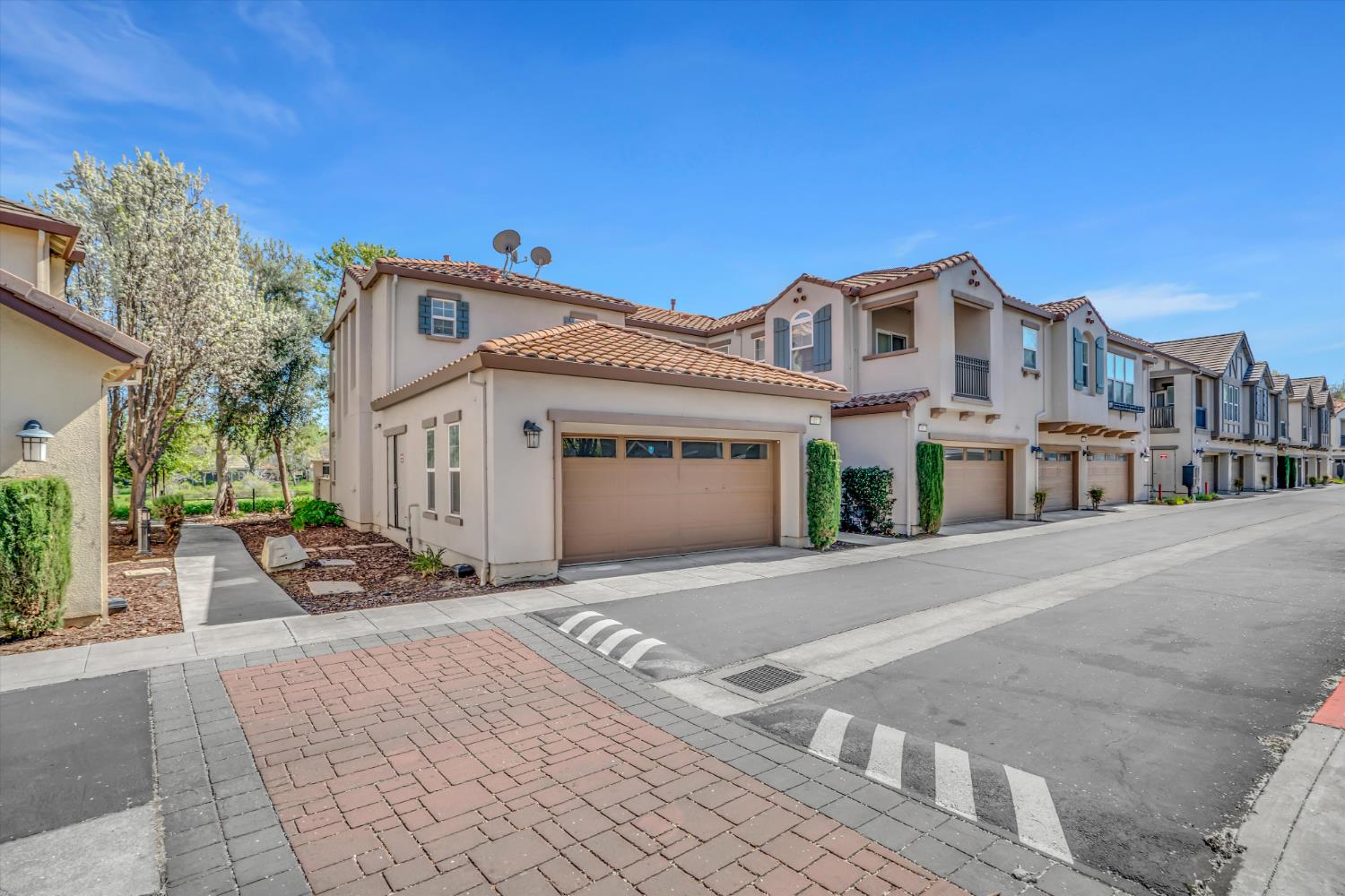 62 South Rio Rapido Drive Tracy, CA 95391 - Photo 4 of 40 a front view of a building with a road