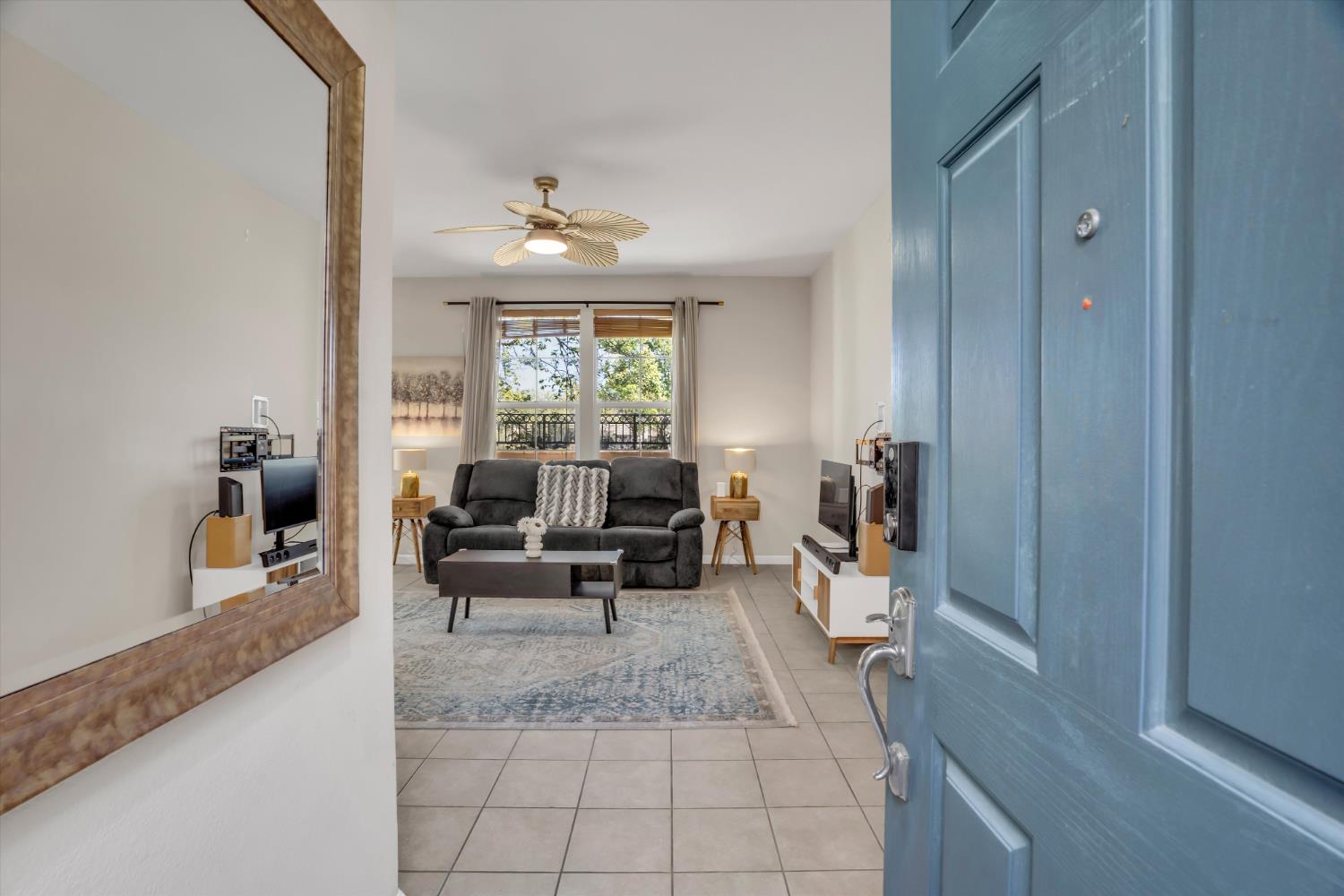 62 South Rio Rapido Drive Tracy, CA 95391 - Photo 8 of 40 a living room with furniture and a window