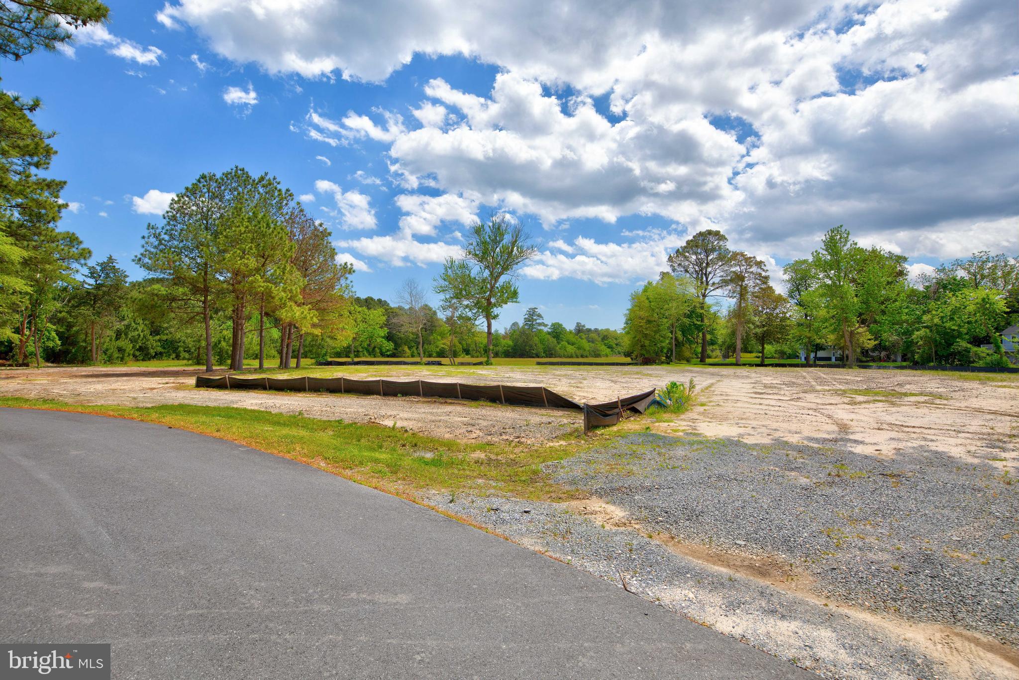 31772 Stevensons Road Dagsboro, DE 19939 - Photo 12 of 17 a view of swimming pool with an outdoor space and seating area