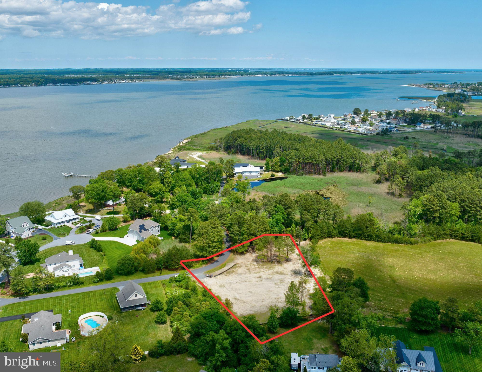31772 Stevensons Road Dagsboro, DE 19939 - Photo 3 of 17 a view of a lake with a beach