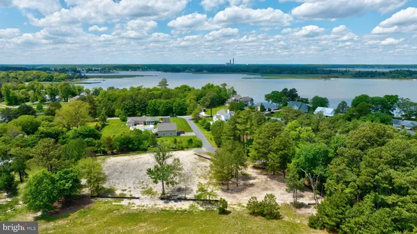 a view of a lake with a yard