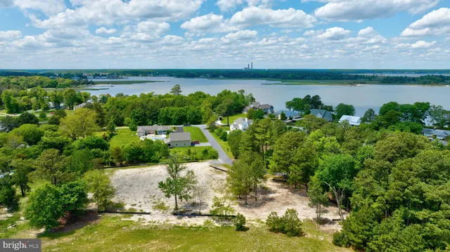 a view of a lake with a yard