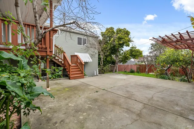 a front view of a house with a yard and a garage
