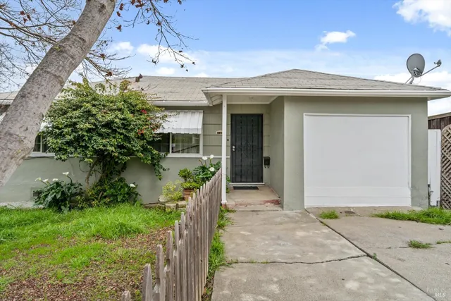 a front view of a house with a porch