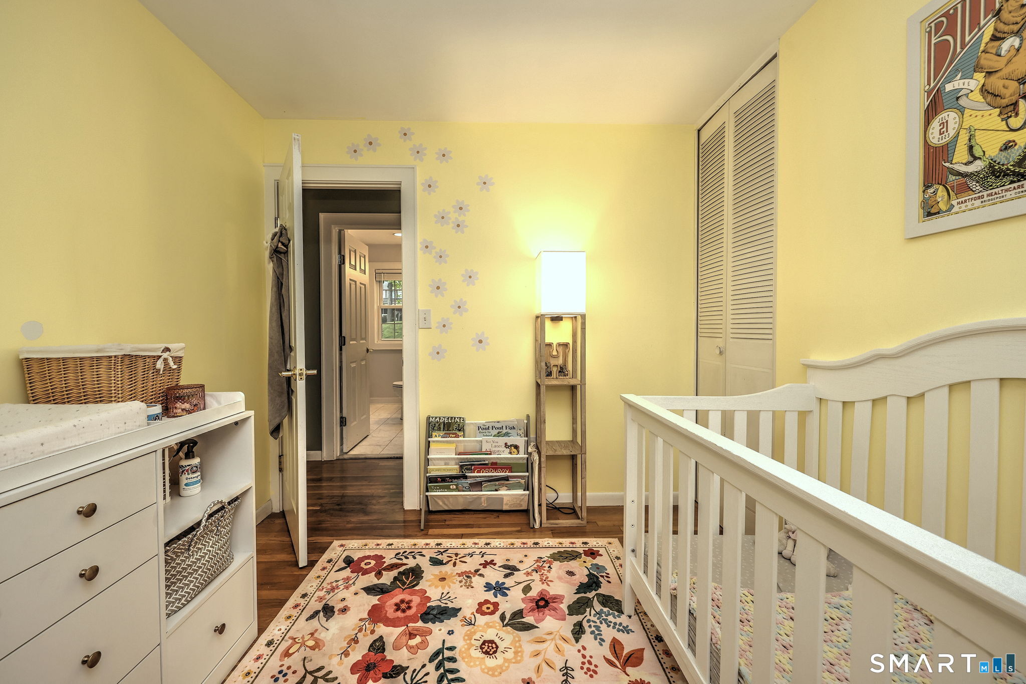265 Shelter Rock Road Fairfield, CT 06825 - Photo 20 of 32 Inviting bedroom with hardwood flooring.