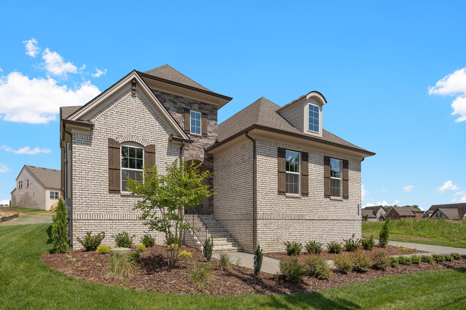3427 Earhart Road Mount Juliet, TN 37122 - Photo 2 of 47 a front view of a house with garden