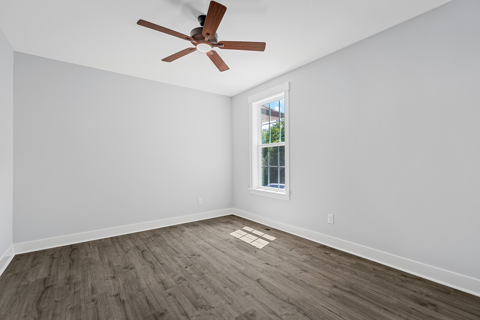 3427 Earhart Road Mount Juliet, TN 37122 - Photo 32 of 47 an empty room with wooden floor and windows