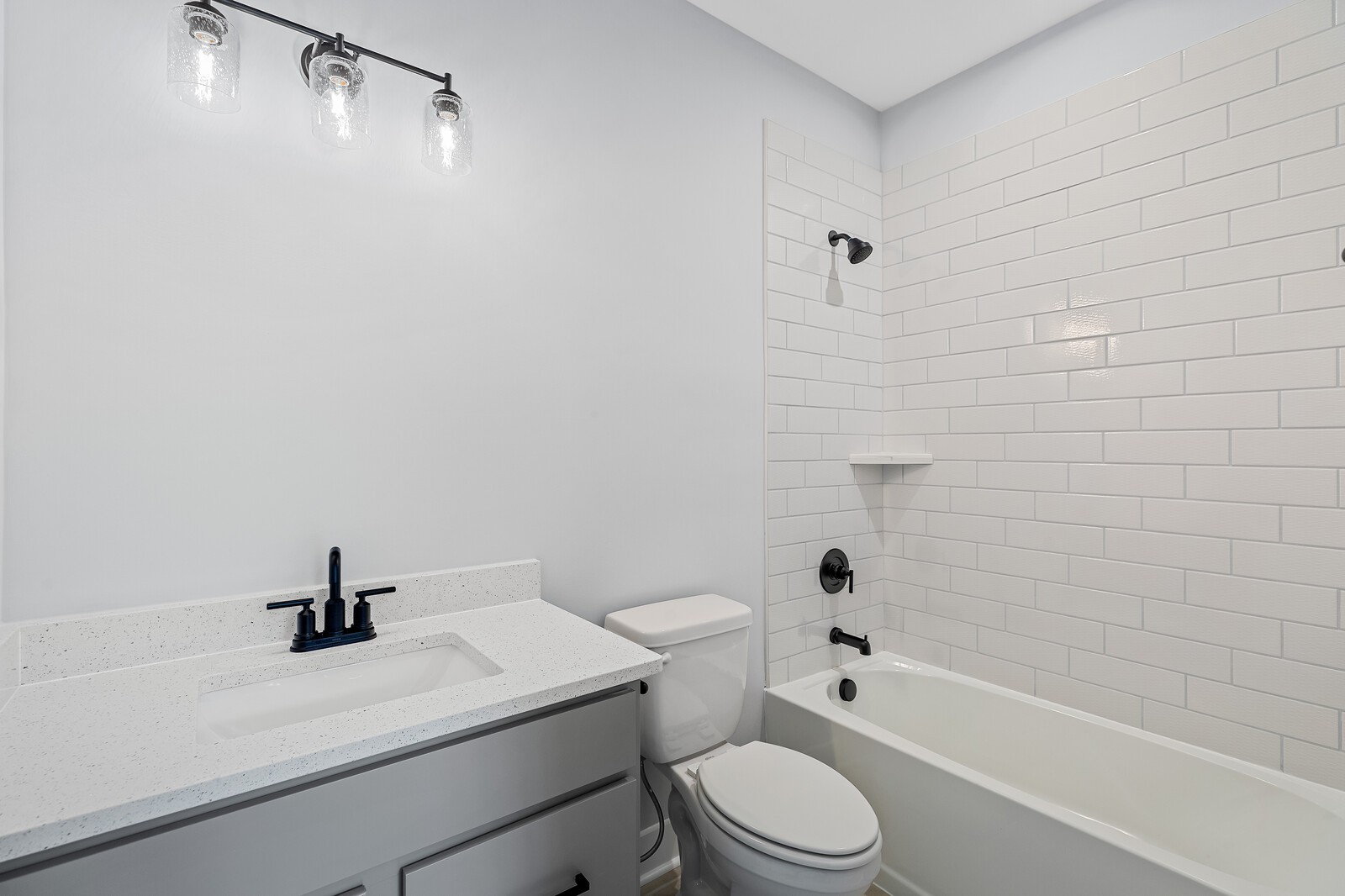 3427 Earhart Road Mount Juliet, TN 37122 - Photo 34 of 47 a bathroom with a sink a toilet and a bathtub