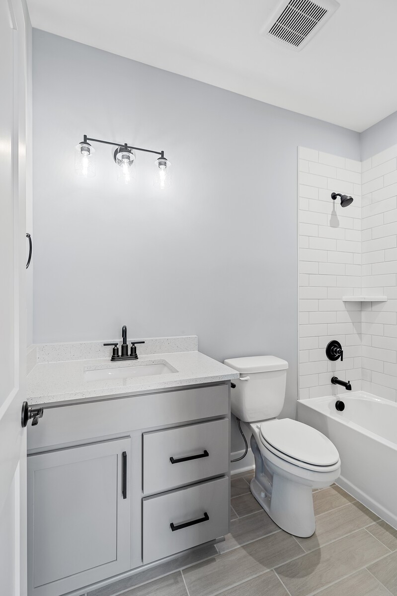 3427 Earhart Road Mount Juliet, TN 37122 - Photo 35 of 47 a bathroom with a sink a toilet and shower