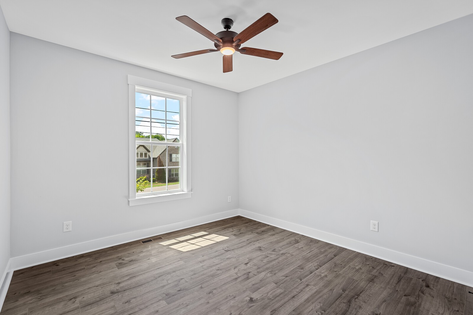 3427 Earhart Road Mount Juliet, TN 37122 - Photo 36 of 47 an empty room with wooden floor and windows