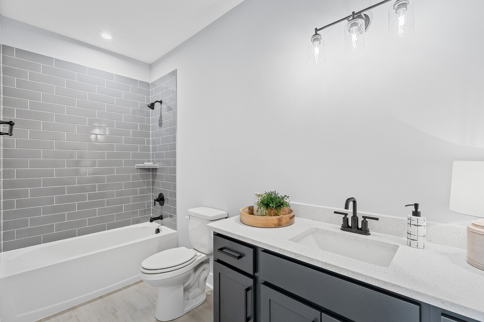 3427 Earhart Road Mount Juliet, TN 37122 - Photo 37 of 47 a bathroom with a sink a toilet and shower