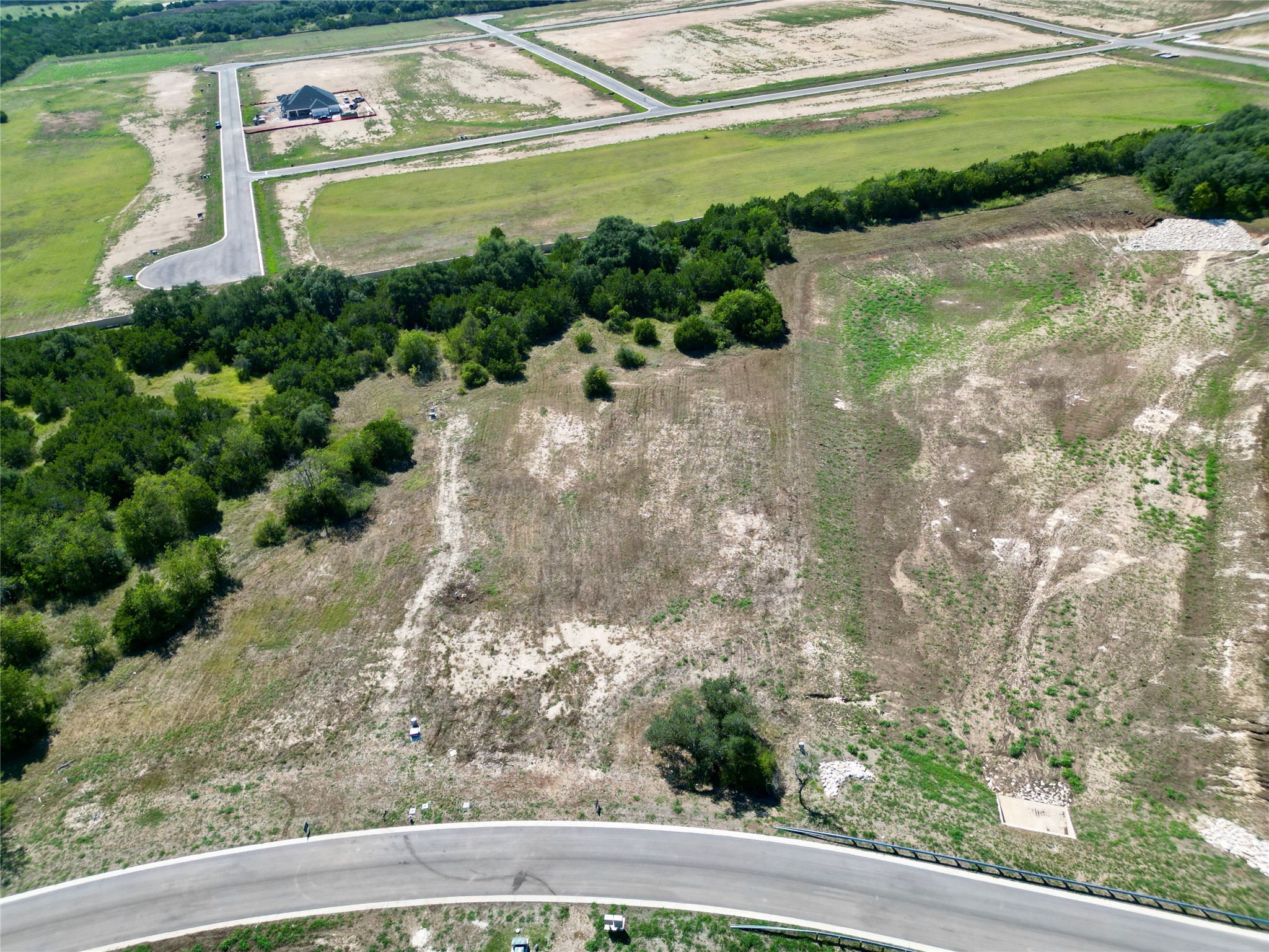 2201 Council Springs Pass Leander, TX 78641 - Photo 11 of 21 a view of a garden with a lake