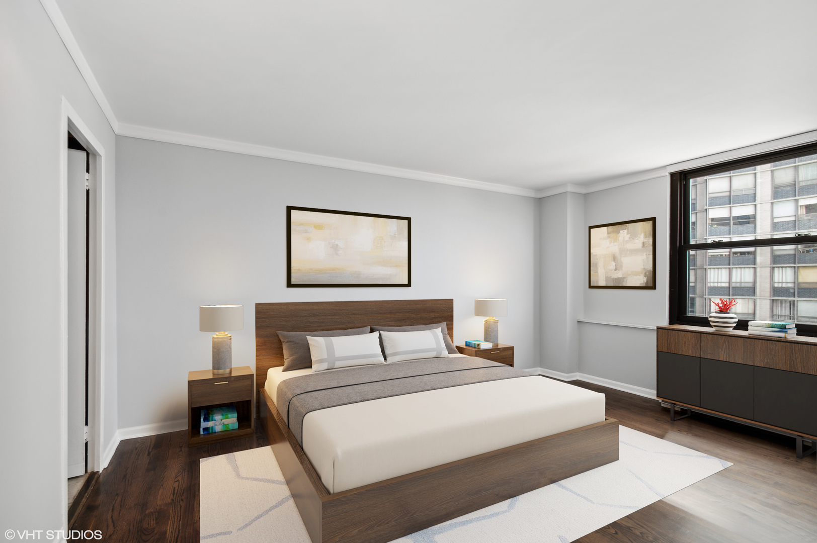 5701 North Sheridan Road, Unit 5T Chicago, IL 60660 - Photo 15 of 27 a bedroom with a large bed and a window
