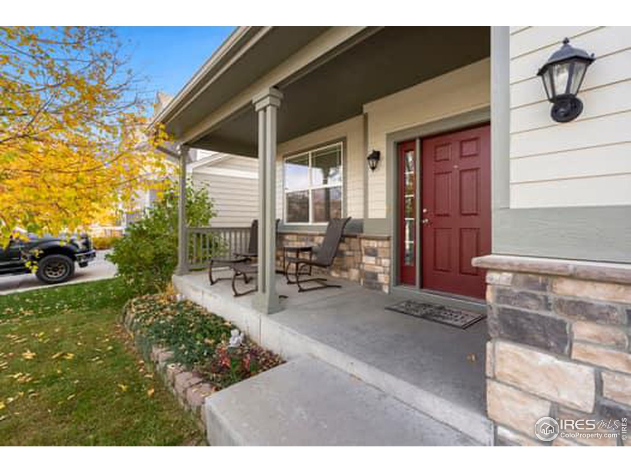 1545 Edenbridge Drive Windsor, CO 80550 - Photo 3 of 28 a view of outdoor space and porch