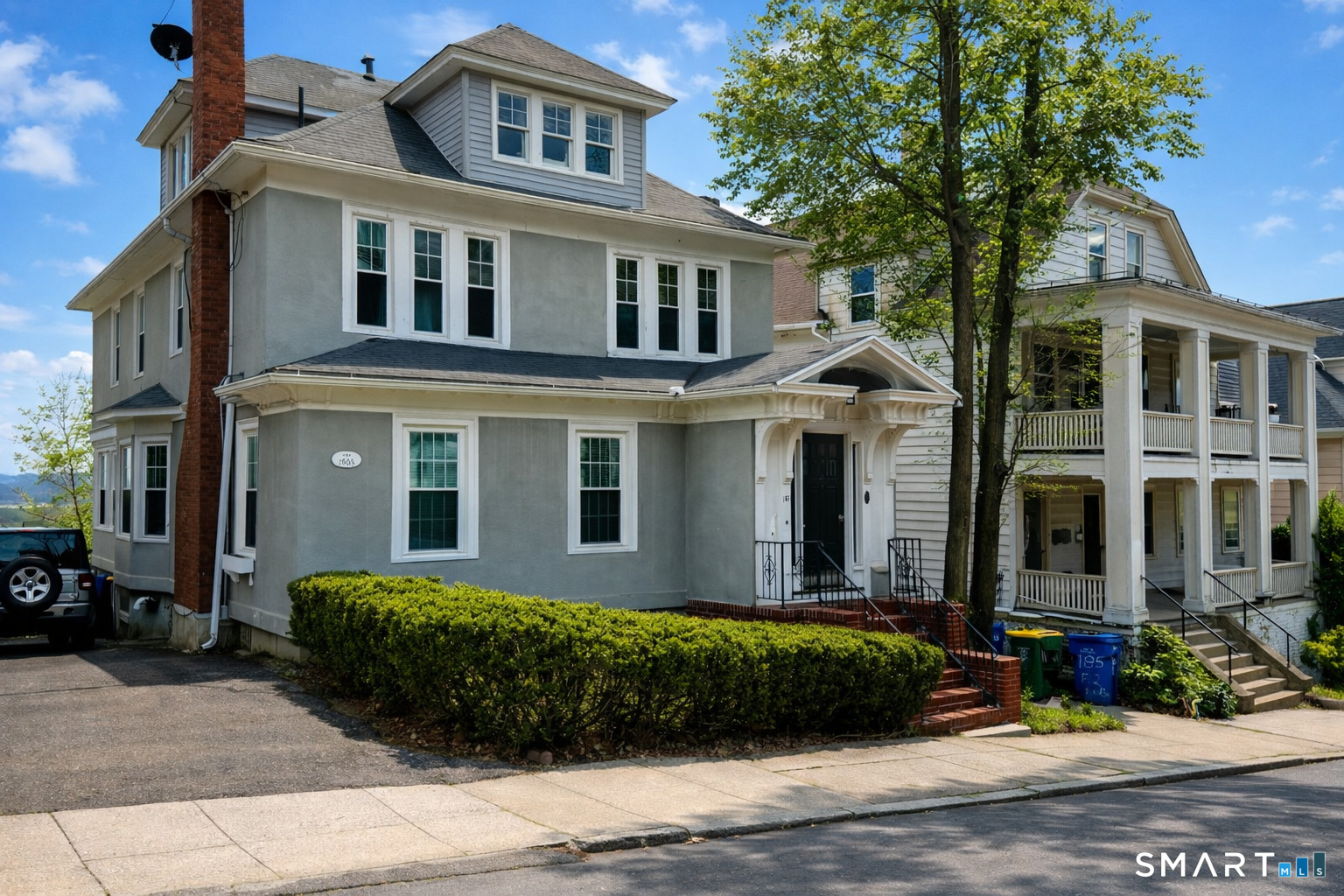 181 Buckingham Street Waterbury, CT 06710 - Photo 1 of 38 a front view of a house with a yard