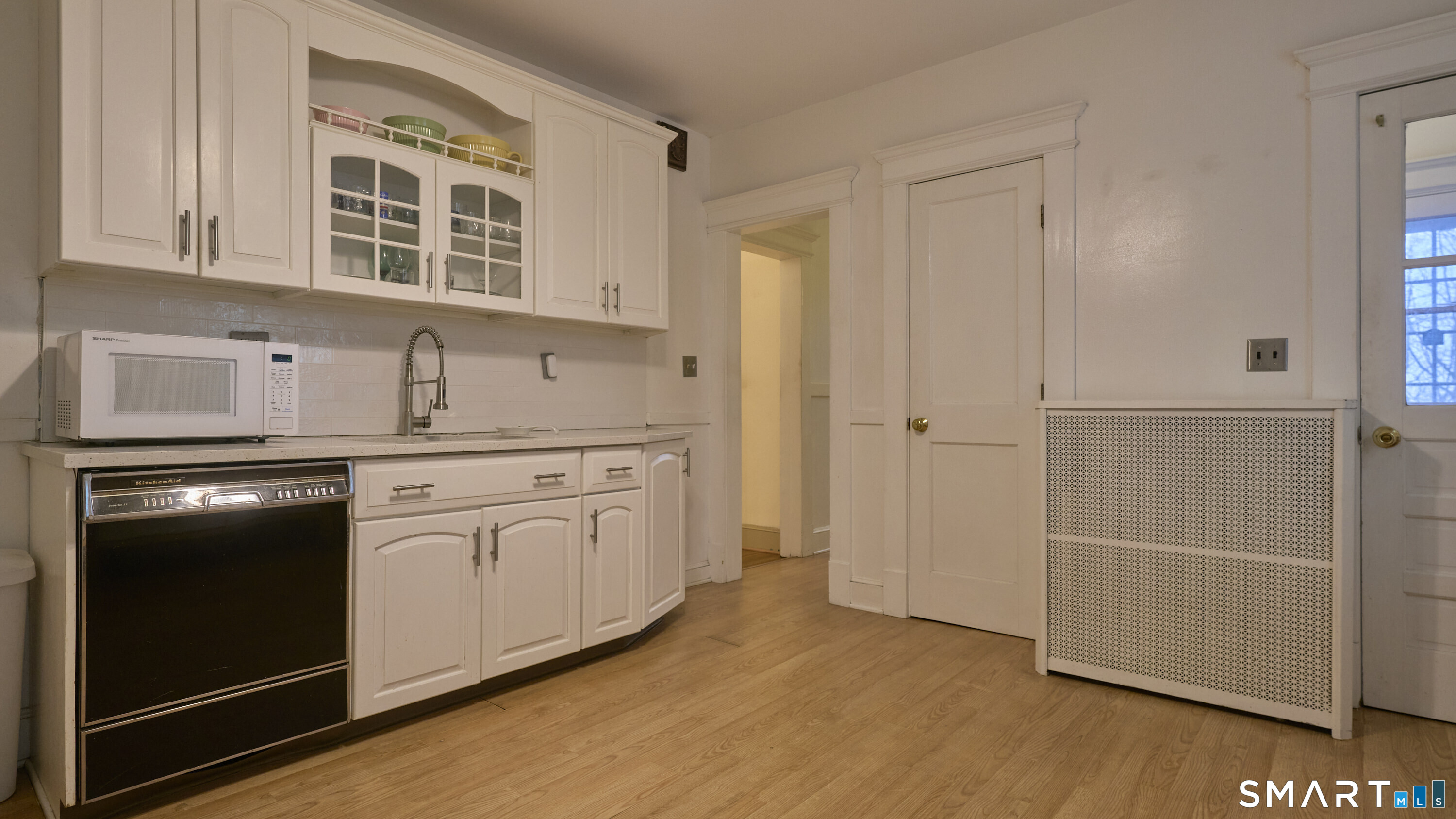 181 Buckingham Street Waterbury, CT 06710 - Photo 12 of 38 a kitchen with stainless steel appliances granite countertop a stove a sink and a refrigerator