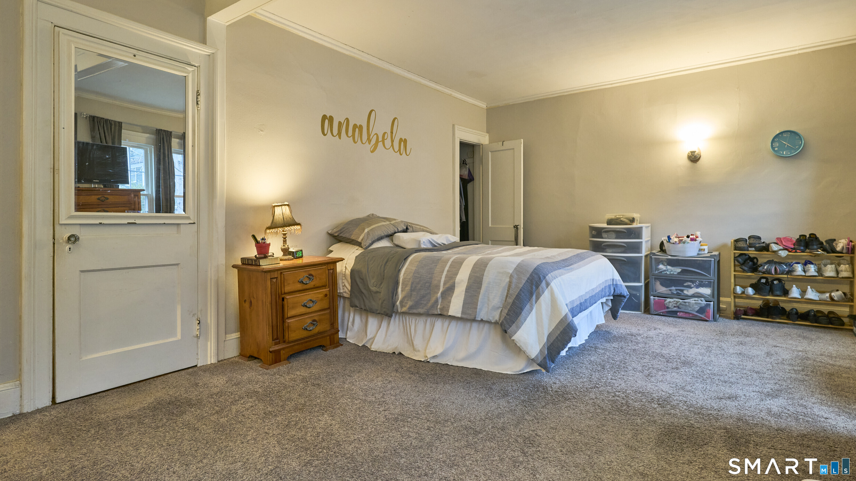 181 Buckingham Street Waterbury, CT 06710 - Photo 20 of 38 a bedroom with a bed and a car