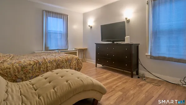 a view of livingroom with furniture and wooden floor