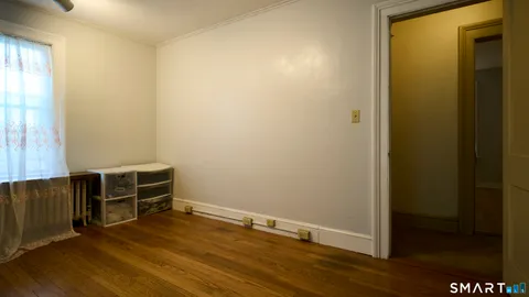 a bathroom with a glass door shower