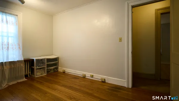 a bathroom with a glass door shower