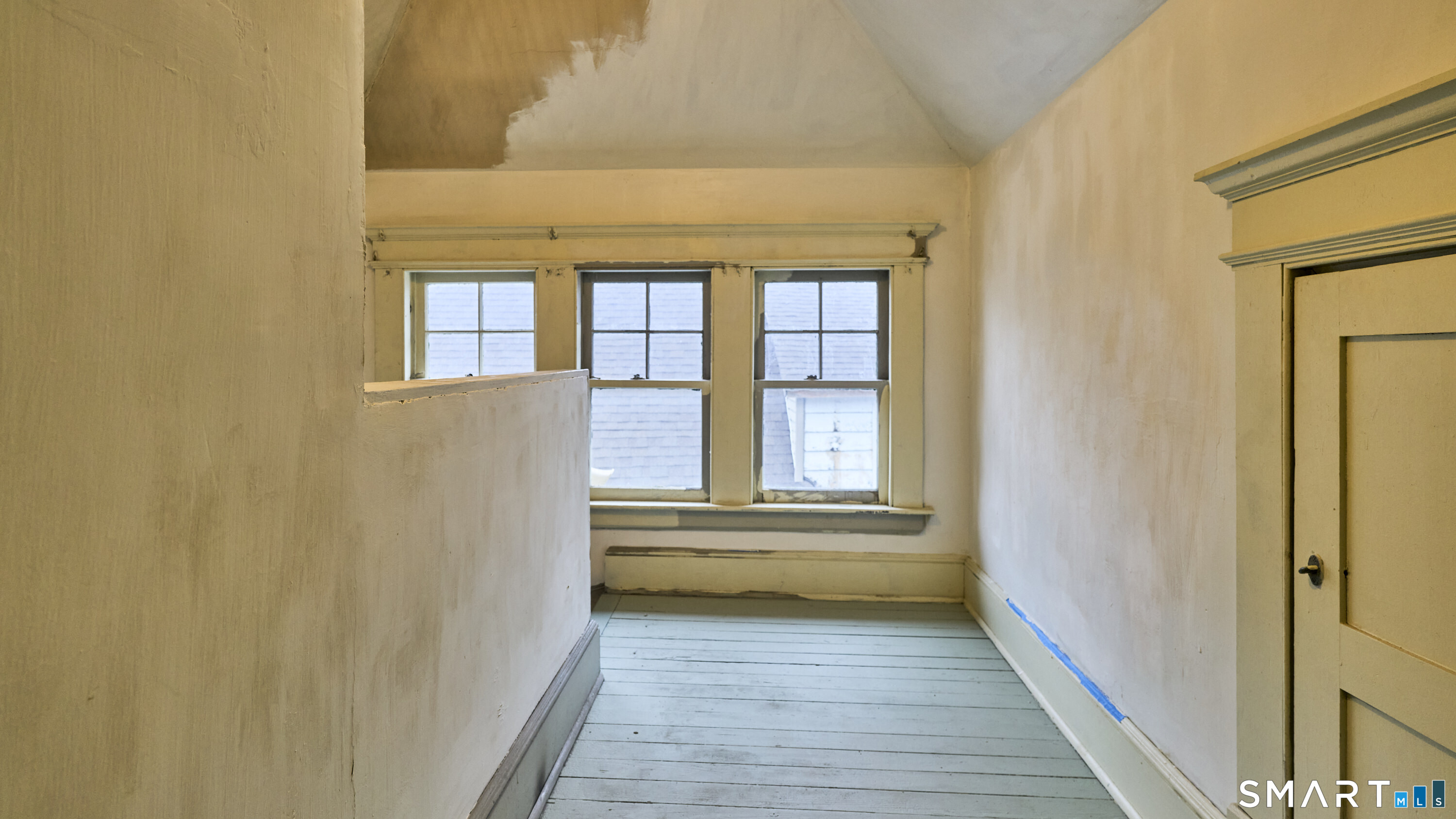 181 Buckingham Street Waterbury, CT 06710 - Photo 31 of 38 a view of a bathroom with wooden floor and a window