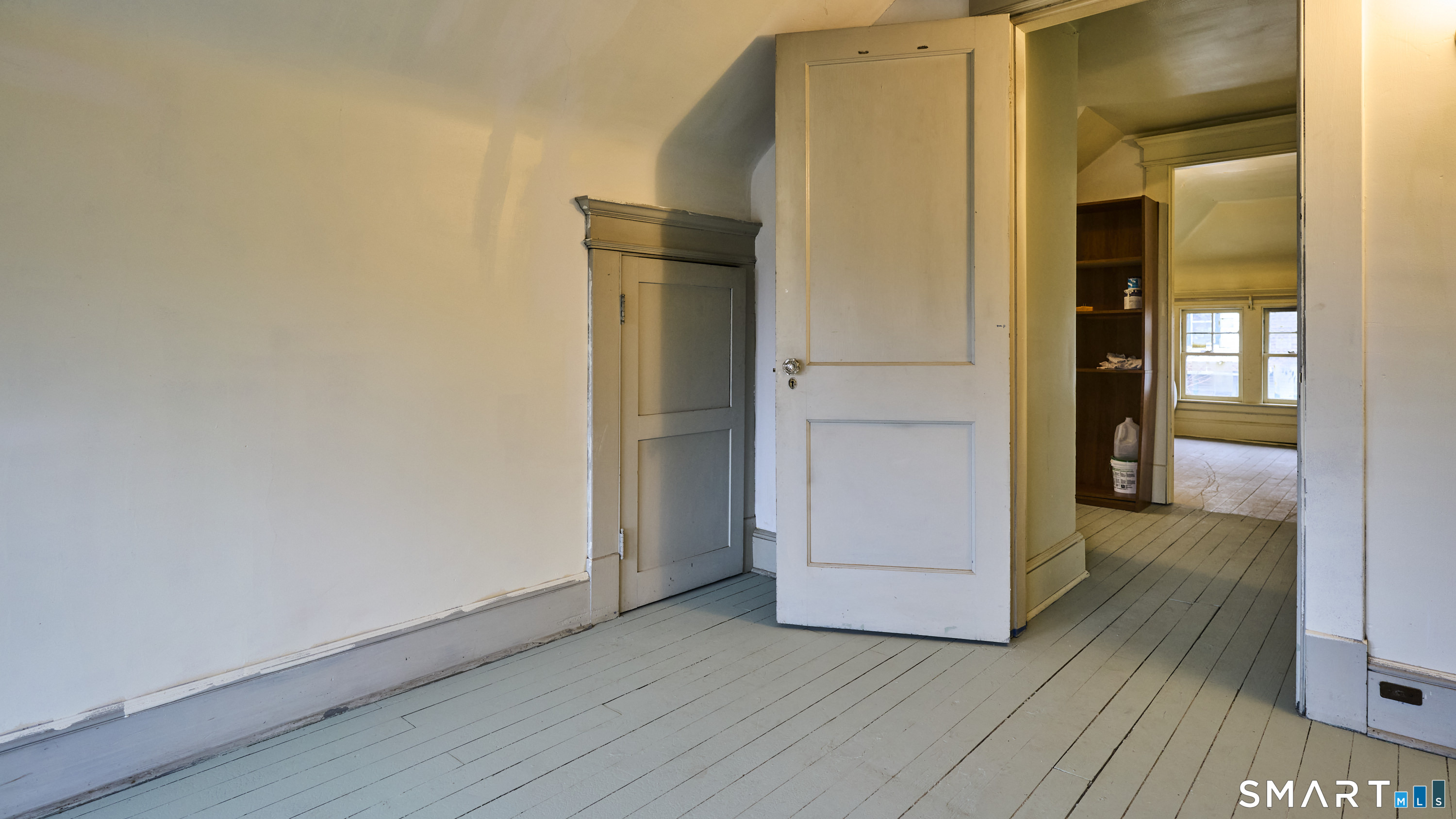 181 Buckingham Street Waterbury, CT 06710 - Photo 37 of 38 an entryway with wooden floor and cabinet