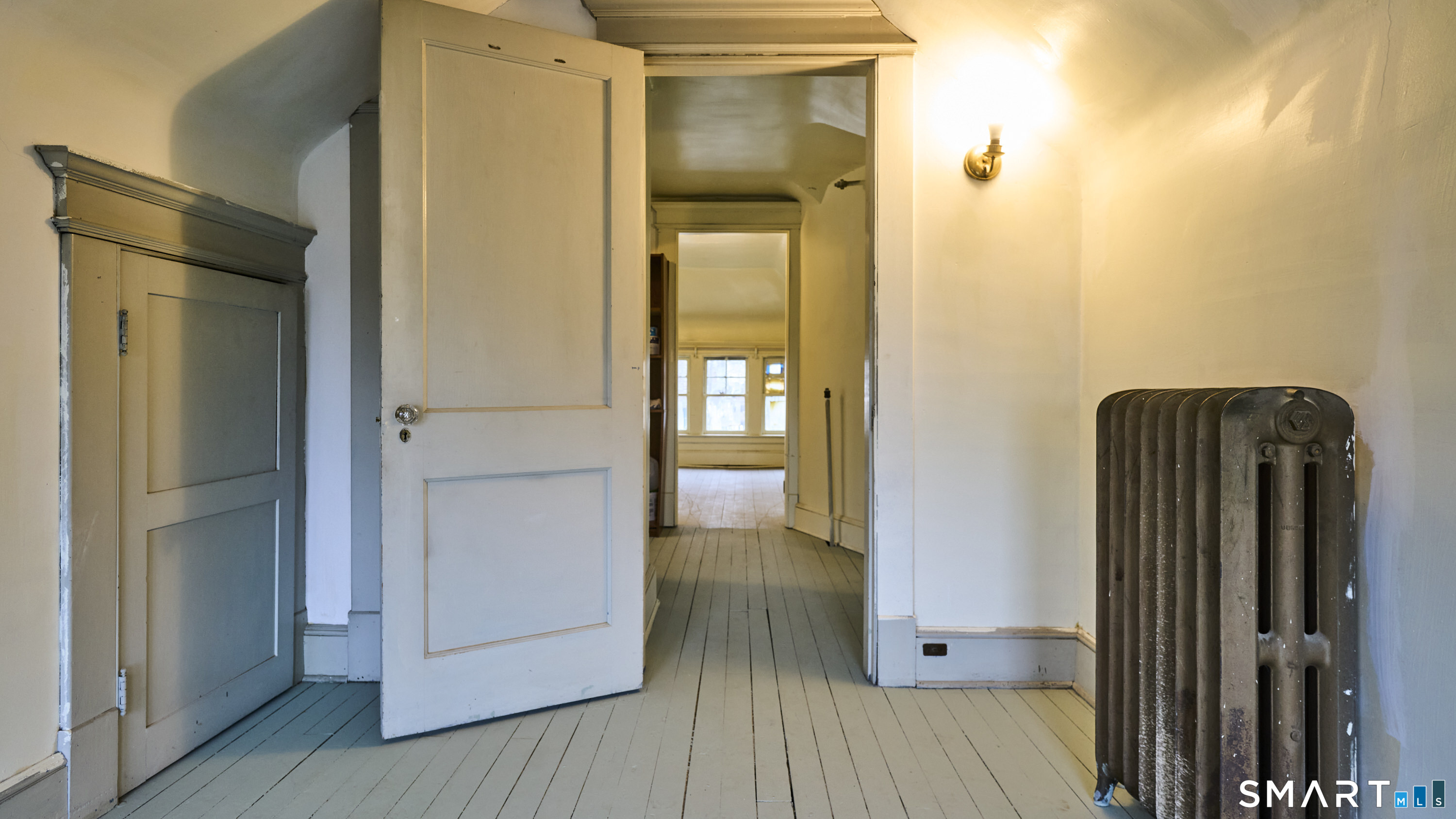181 Buckingham Street Waterbury, CT 06710 - Photo 38 of 38 a view of hallway with wooden floor