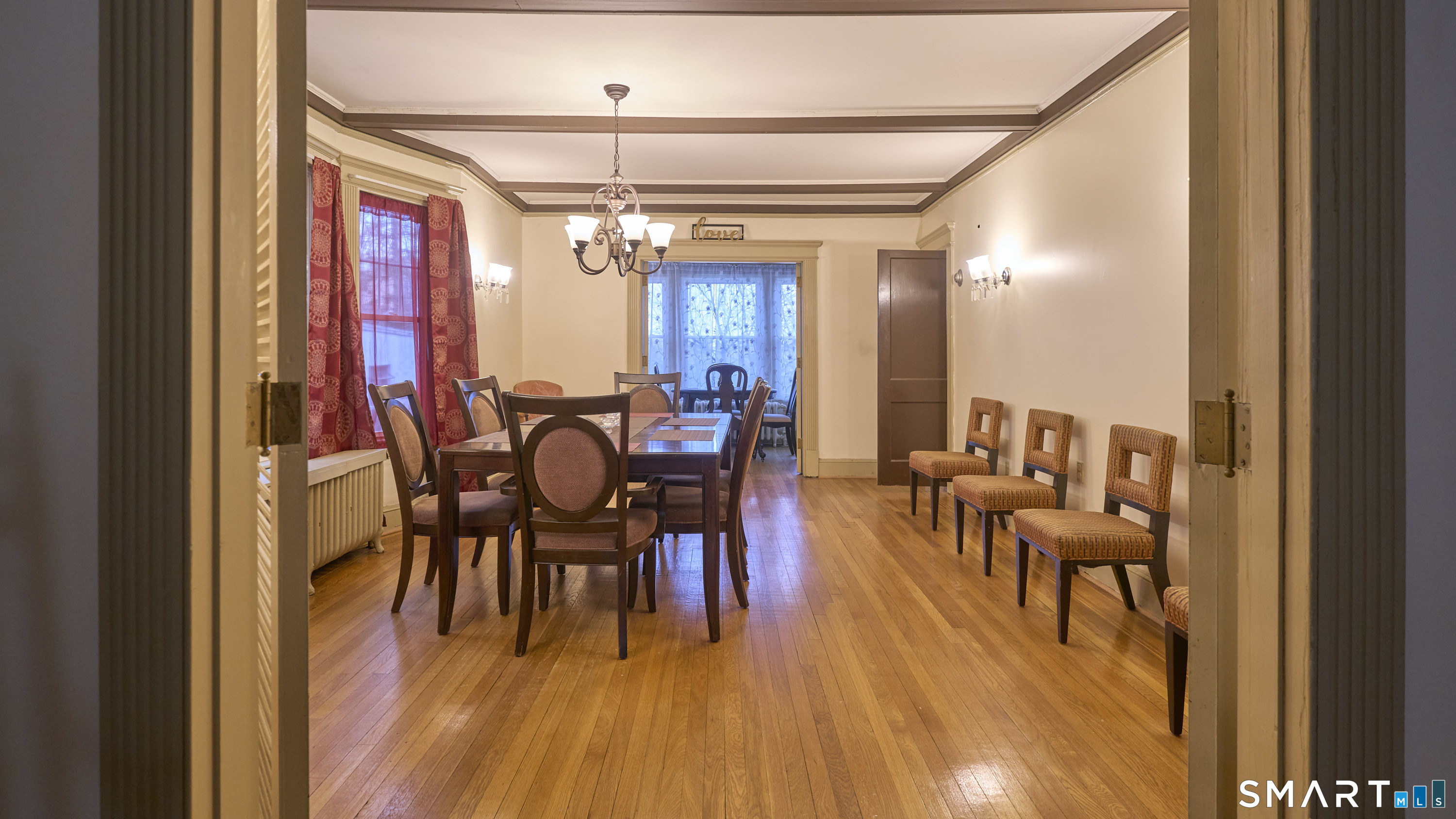 181 Buckingham Street Waterbury, CT 06710 - Photo 4 of 38 a view of a dining room with furniture and chandelier