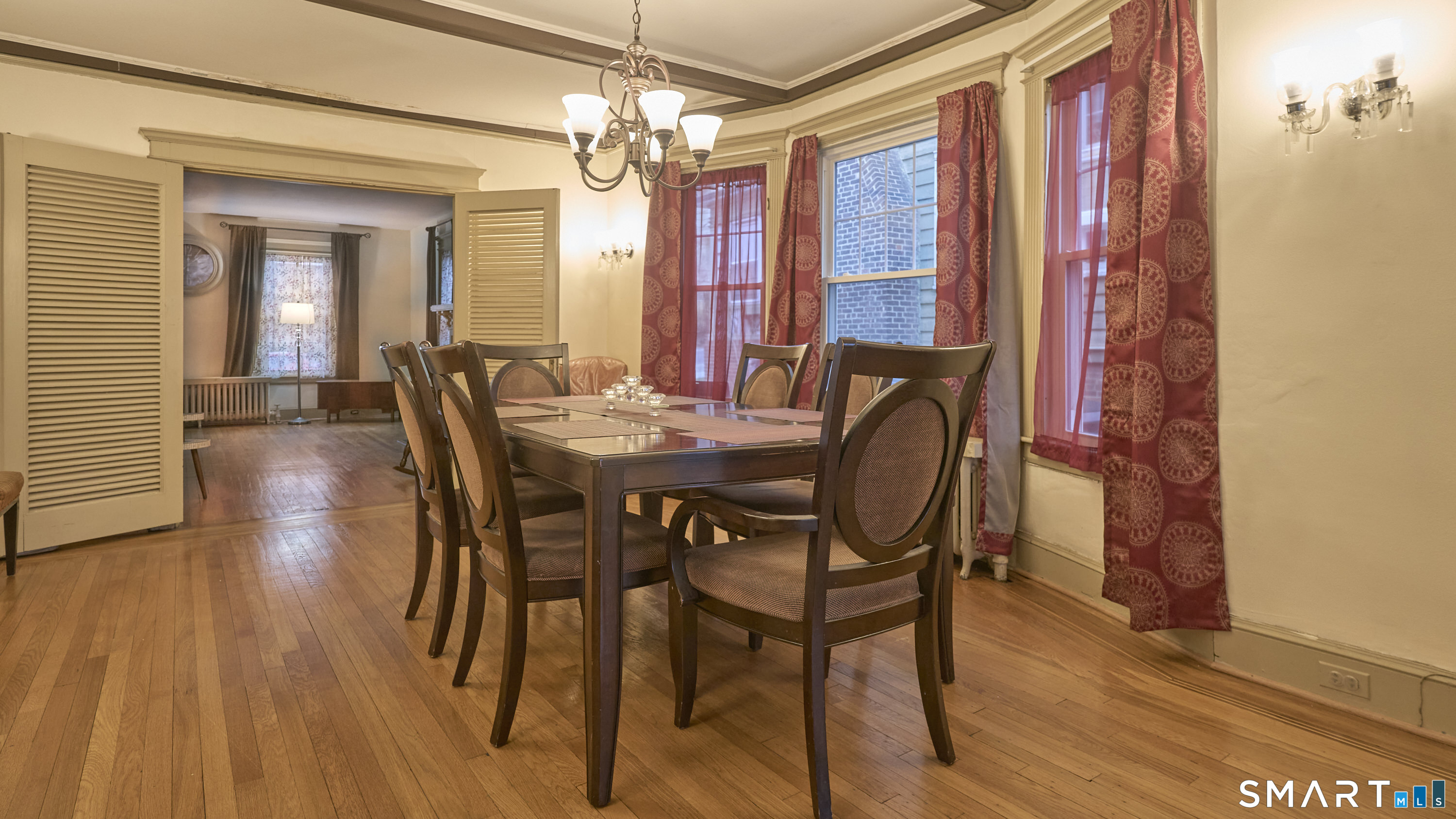 181 Buckingham Street Waterbury, CT 06710 - Photo 6 of 38 a view of a dining room with furniture window and wooden floor