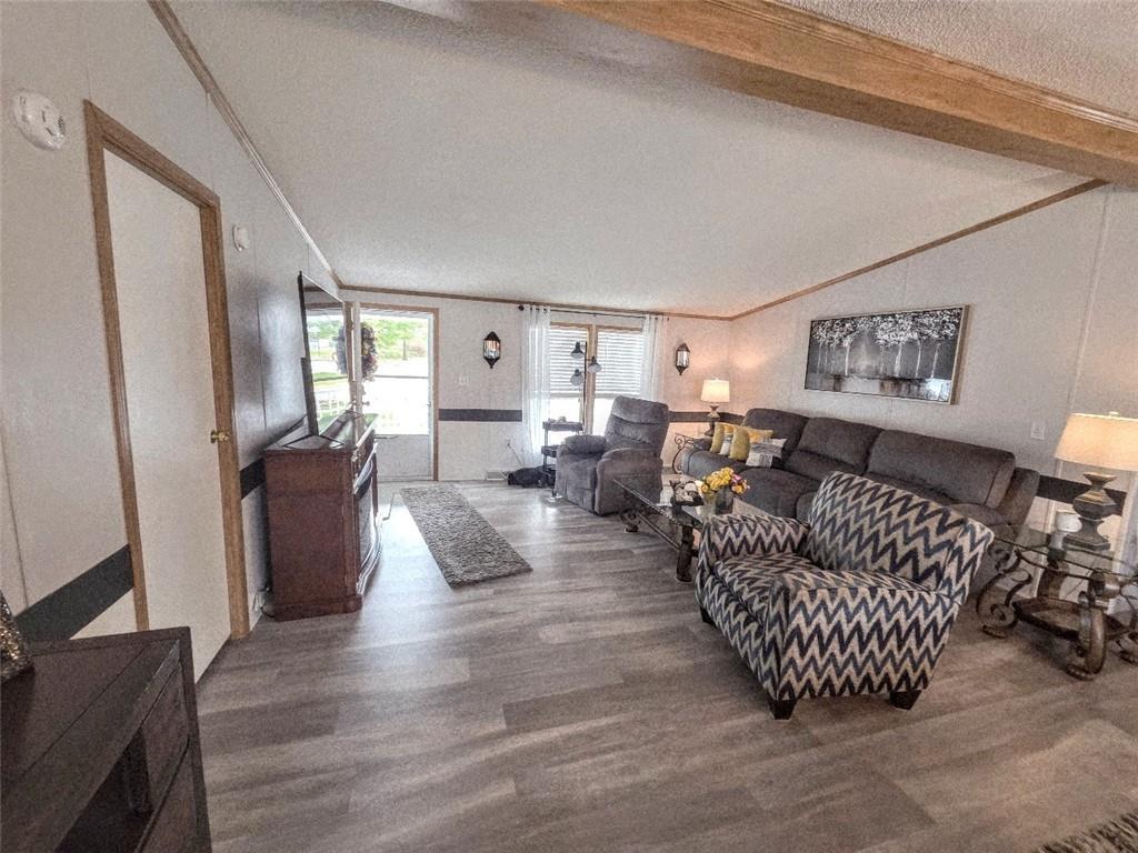105 Eagle Pointe Estates New Eagle, PA 15067 - Photo 17 of 39 a living room with furniture rug and wooden floor