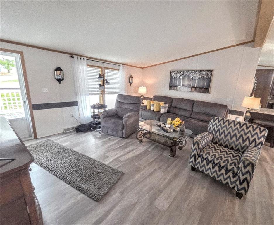 105 Eagle Pointe Estates New Eagle, PA 15067 - Photo 18 of 39 a living room with furniture and a rug