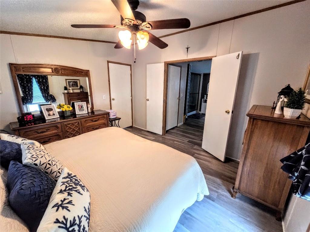 105 Eagle Pointe Estates New Eagle, PA 15067 - Photo 21 of 39 a bedroom with a bed and a mirror on the dresser